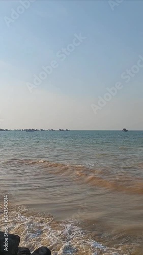 Clear Waves Lashing on the Sandy Shore
