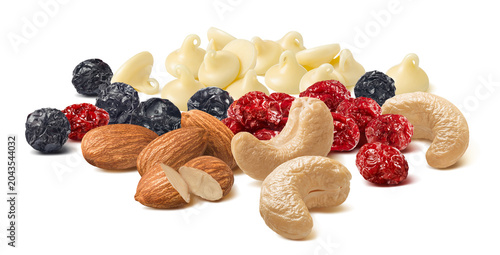 Almond and cashew nuts mix, blueberry, cranberry, white chocolate drops isolated. Real food photography