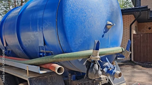 Sewage pumping machine. Septic tank. Pumping wastewater from a septic tank. Septic tank maintenance
