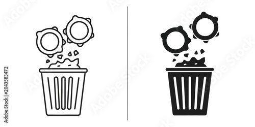 Fotografie Discarding circular items with gear teeth into a waste bin during a clean up con