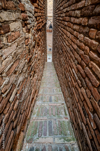 The narrowest alley in Italy. It is located in the historic center of Ripatransone.