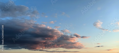 Storm clouds in the sky, sunset with clouds.
