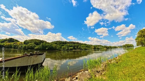 4K Timelapse video with moving waters of river danube and moving clouds near Windorf, Passau, Bavaria, Germany