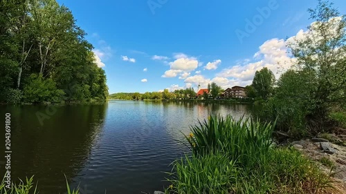 4K Timelapse video with moving waters of river danube and moving clouds near Windorf, Passau, Bavaria, Germany