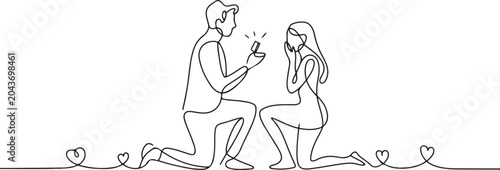 Foto The guy makes a marriage proposal to his girlfriend
