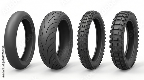 Four Different Motorcycle Tires on White Background