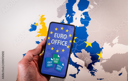 Hand holding a smartphone displaying the Euro Office app and file icons, representing open source office software and digital sovereignty in the European Union. Concept of European digital sovereignty