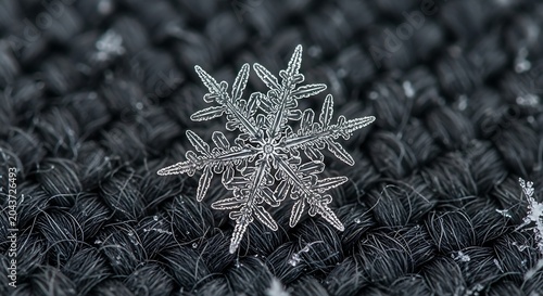 Close-up of Sparkling Silver Snowflake on Dark Textured Background with Festive Mood