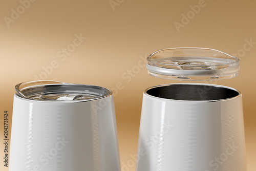 Vacuum Insulated Stainless Steel Tumbler with Brushed Aluminum Finish and Clear Acrylic Lid on Gold Background