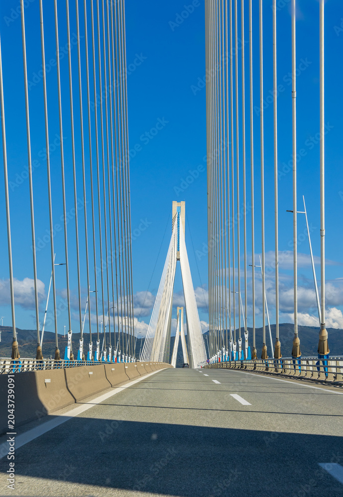 Obraz premium The famous Rio-Antirrio multi-suspension bridge (Charilaos Trikoupis Bridge) in Greece