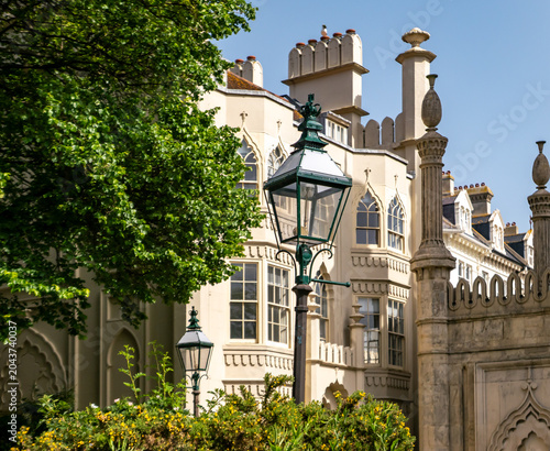 Vintage street lamp in front of an old and historic building