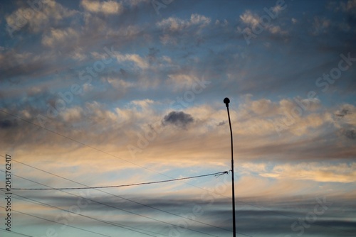 Lantern against the backdrop of a beautiful evening sky cityscape city sunset
