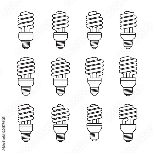Compact fluorescent light bulbs arranged in a grid for energy saving concepts and innovation in lighting technology