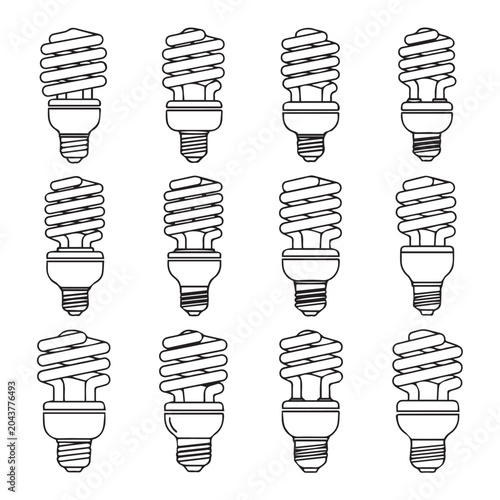 Compact fluorescent light bulbs arranged in a grid pattern against a white background