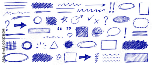 Fotografie Hand drawn blue pen doodle scribbles with messy school annotation marks, underli