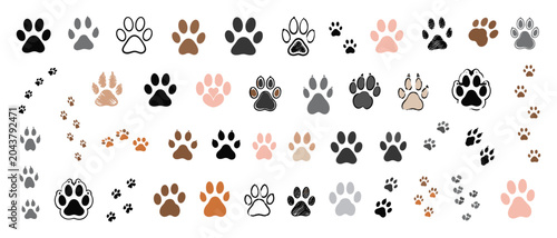 Bild auf Leinwand Hand drawn paw print collection with cat and dog footprints, pet footstep marks,