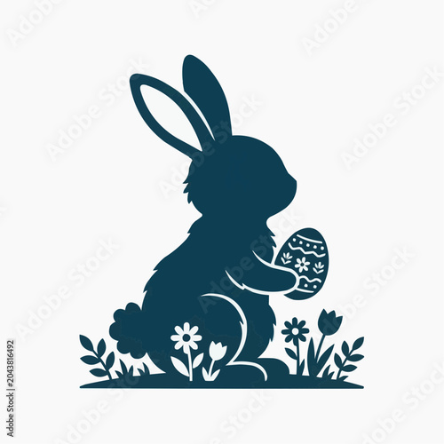 Easter bunny silhouette holding a decorated egg with flowers and grass