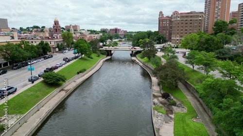 flyover of waterway in urban shopping center