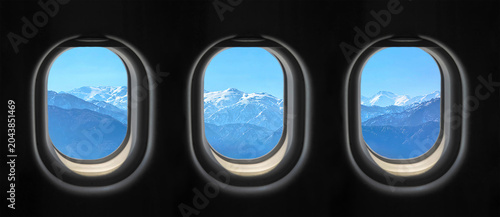 View outside the plane window. Photograph of the view through the plane window.