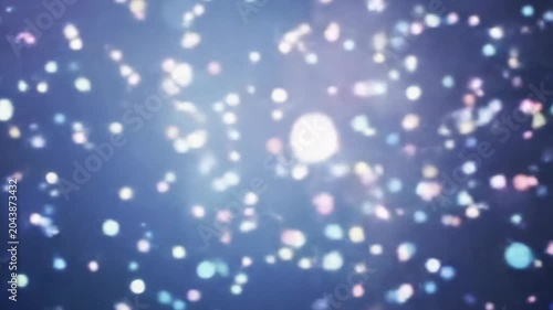 Sparkling Bokeh Lights Floating Against a Dark Blue Background.