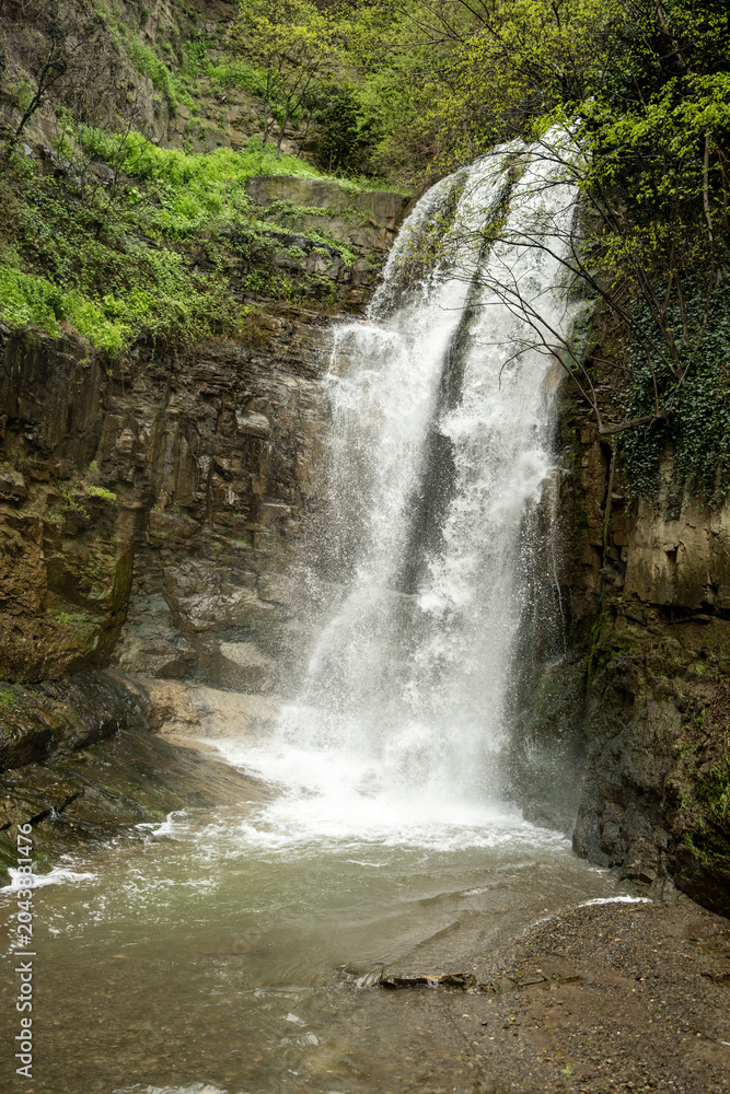 Obraz premium Leghvtakhevi waterfall is located in the old city of Tbilisi, one of the ancient place Abanotubani. The waterfall is 22 meters tall.