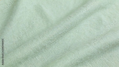 Closeup of textured green fabric