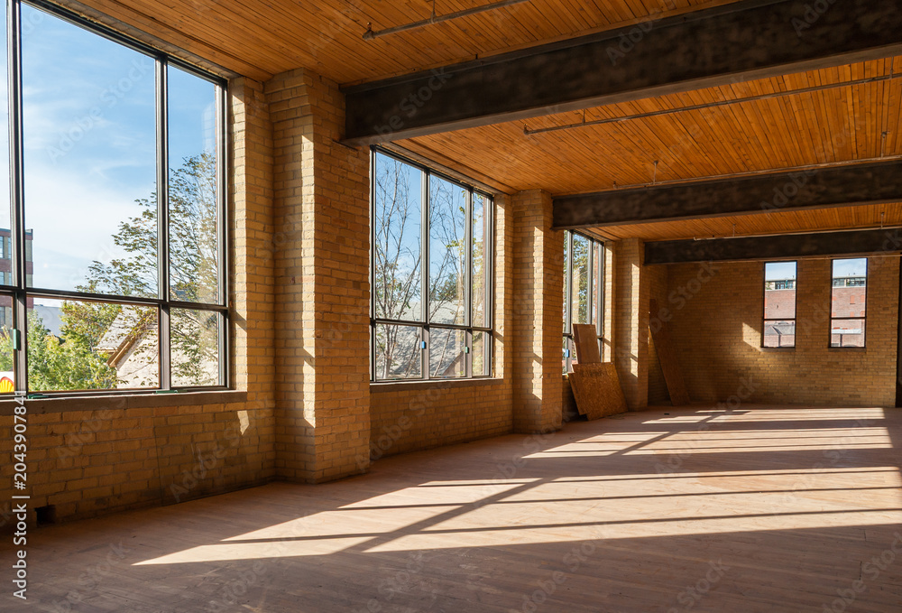 Naklejka premium Bright Empty Loft Office Interior In Toronto