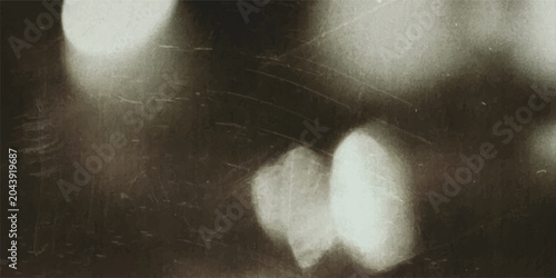 Tableau sur toile Abstract blurred light bokeh circles on dark background with soft ethereal white