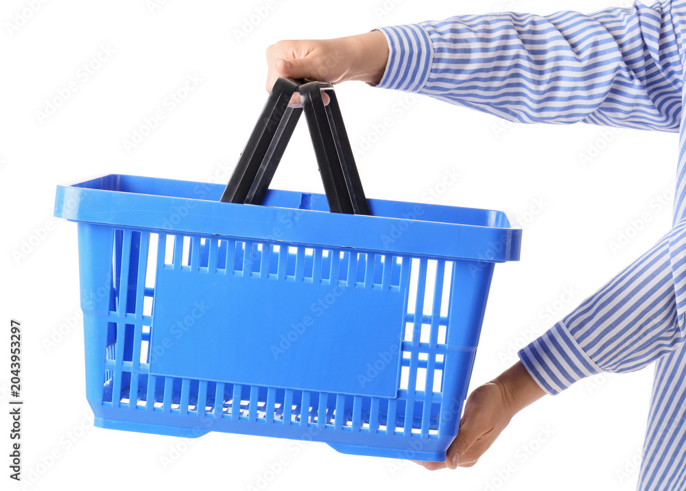 Fototapeta premium Woman with blue shopping basket on white background