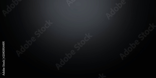Foto A lone spotlight illuminates a dark, empty stage, suggesting anticipation and mystery