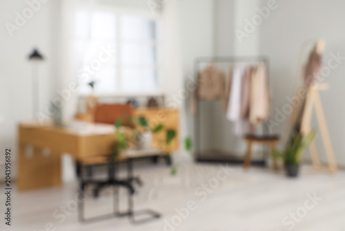 Blurred view of clothes sty...