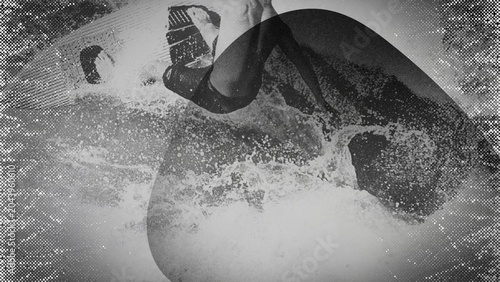 Black and white photo of professional surfer with grunge texture. A Man Surfing a Wave Background.
