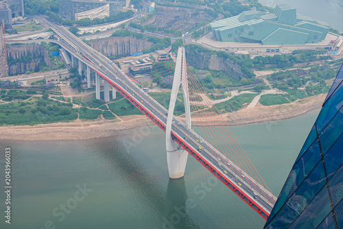 Obraz na płótnie Aerial view of Qiansimen Bridge traffic and Chongqing Grand Theatre over Jialing