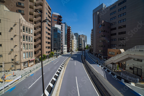A cityscape of traffic jam at the city street in the business town wide shot