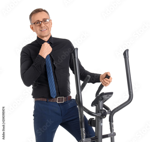 Mature businessman on exerc...