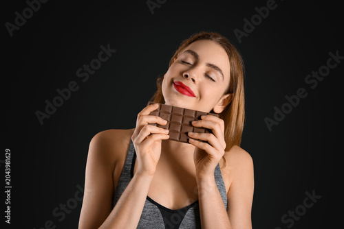 Young woman with chocolate ...
