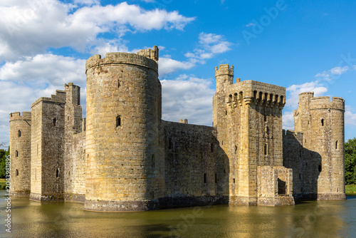 Obraz na płótnie Medieval Bodiam Castle with Water Moat under Blue Sky in Bodiam, East Sussex, En