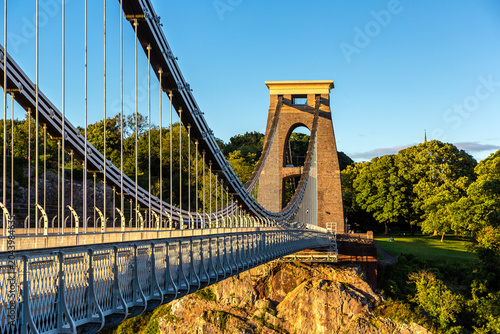 Clifton Suspension Bridge at Dramatic Golden Sunset over the River Avon in Bristol, England, UK