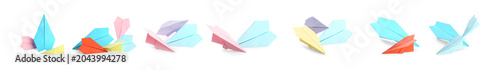 Set of colorful paper planes on white background