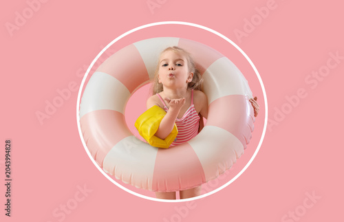 Cute little girl in swimsui...