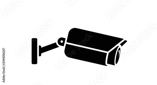 Security camera on a wall mount.