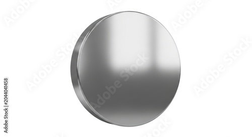 A shiny metallic object with a reflective surface, appearing as a perfect circle