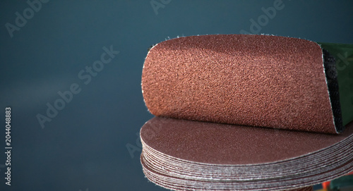 Картината върху платно Stack of round sandpaper discs for orbital sander, close-up detail