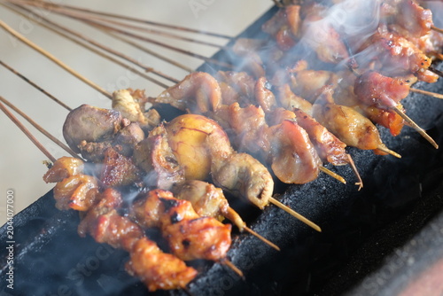 Sate Ambal is a chicken satay typical of the Kebumen area of Central Java. This satay is made from chicken meat seasoned with spices. Sate is cooked by grilling on a charcoal grill. Indonesian food.