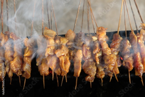 Sate Ambal is a chicken satay typical of the Kebumen area of Central Java. This satay is made from chicken meat seasoned with spices. Sate is cooked by grilling on a charcoal grill. Indonesian food.