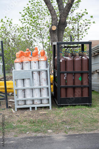 industrial gas cylinders kept outside