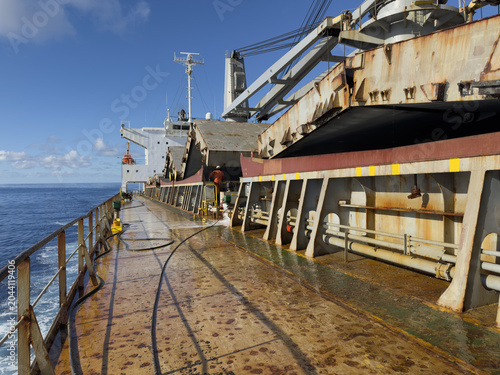 Foto ship main deck and hatch covers partly opened