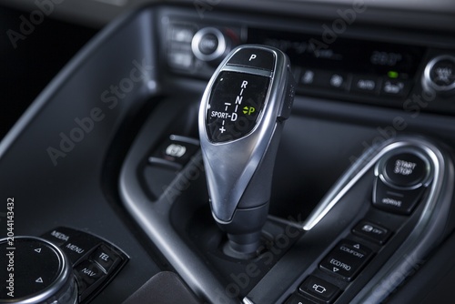 Closeup shot of the automatic gear stick of a modern sport car