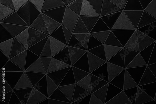 Dark Geometric Pattern: A striking abstract background composed of interlocking black geometric shapes, creating a modern and sophisticated visual texture.
