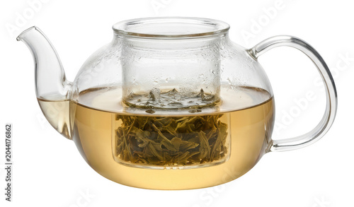 Fotografía Glass teapot filled with brewing green tea and loose leaves in the infuser isola